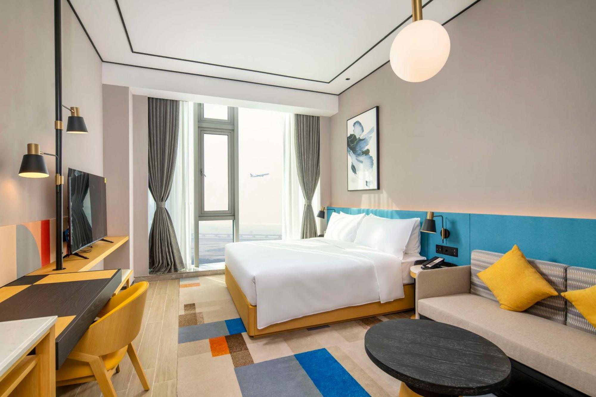 Hilton Garden Inn Shenzhen Airport,Enjoy 24-Hour One Way Free Delivery From Hotel To Shenzhen Baoan Airport On The Hour Zewnętrze zdjęcie